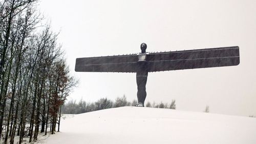 Snow surround the Angel of the North statue in north-east England. (AP).