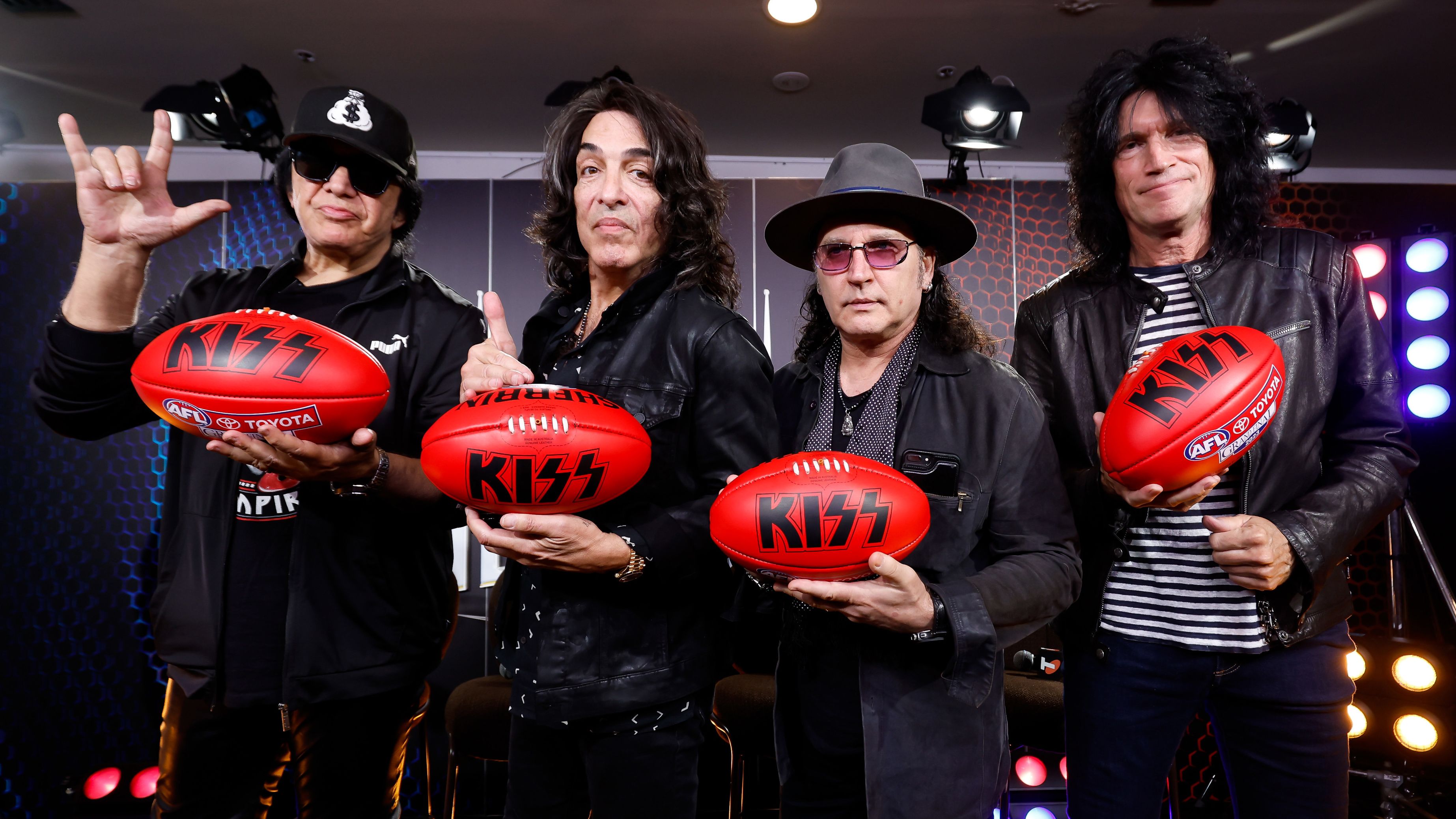 Kiss band members Gene Simmons, Tommy Thayer, Paul Stanley and Eric Carr will preform ahead of the 2023 AFL grand final.