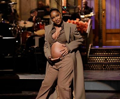 Actress Keke Palmer reveals pregnancy while hosting Saturday Night Live.