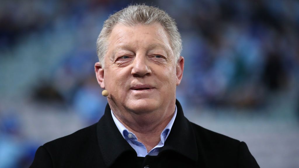 Phil Gould smiles during a tv broadcast.