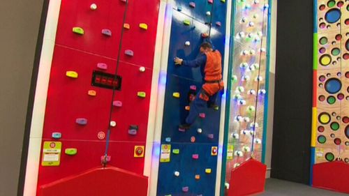 The surf house also includes Perth's first indoor adventure climbing house. (9NEWS)