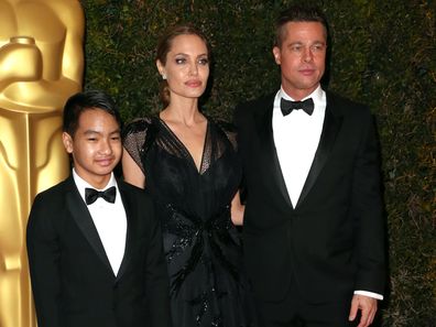 Maddox Jolie-Pitt with parents Angelina Jolie and Brad PItt at the Academy of Motion Picture Arts and Sciences' Governors Awards in November 2013.