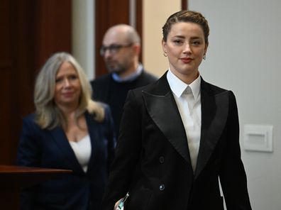 Actress Amber Heard arrives at the courtroom at Fairfax County Courthouse in Fairfax, Va., Tuesday, May 3, 2022. 