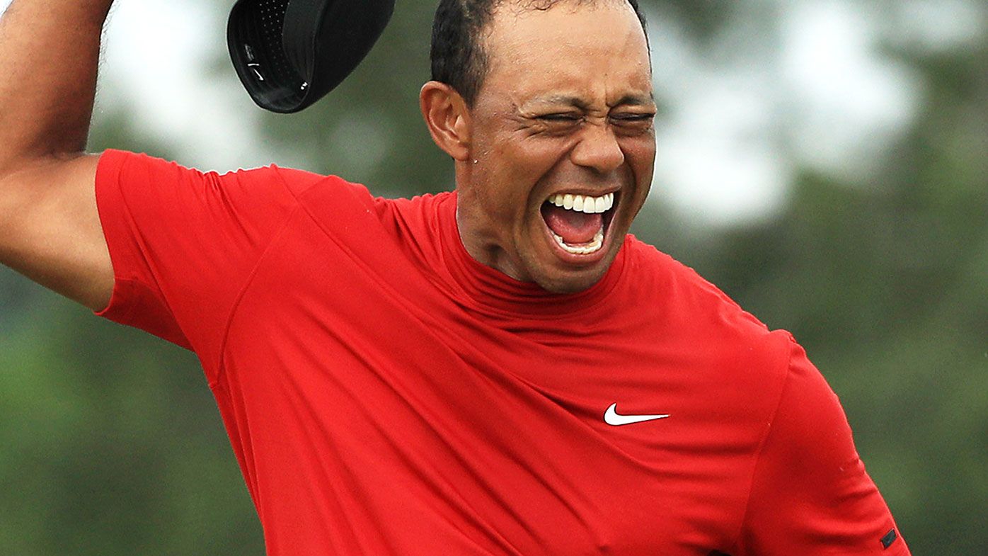 Tiger Woods celebrates his fifth Masters title.