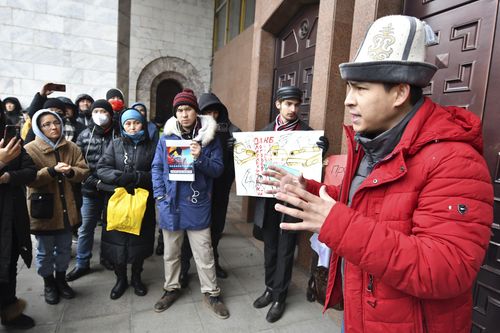 Protesters listens to a speaker as they gather in support of Kazakh opposition and against deploying Kyrgyzstan's troops to Kazakhstan during a rally in Bishkek, Kyrgyzstan, Friday, Jan. 7, 2022. 