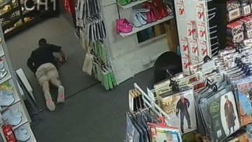 A wanted man was cornered inside a costume shop in Brisbane. 