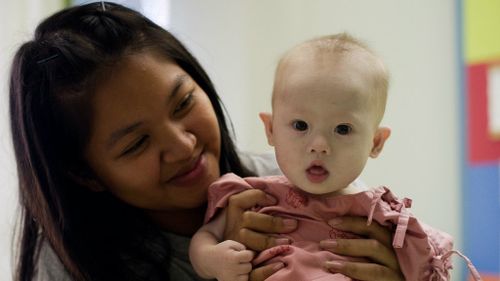 Thai surrogate mother Pattaramon Chanbua with baby Gammy. (Getty)