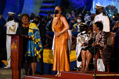 Prime Minister of Barbados Mia Mottley (L) and President of Barbados, Dame Sandra Mason (R) honour Rihanna