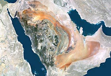 The Qatar Peninsula borders which other nation on the Arabian Peninsula?