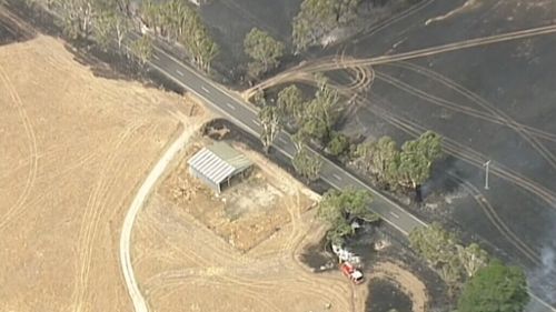At least 160 firefighters are tackling the fire. (9NEWS)