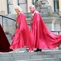 Charles and Camilla don red capes to St Paul's Cathedral