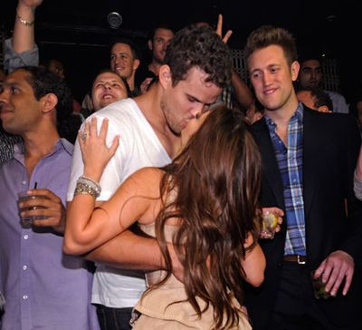 Fiance Kris Humphries wasn't far - he threw his bachelor party on the same night at a different club, celebrating with Kim's brother Robert and Kardashian beaus Scott Disick and Lamar Odom.