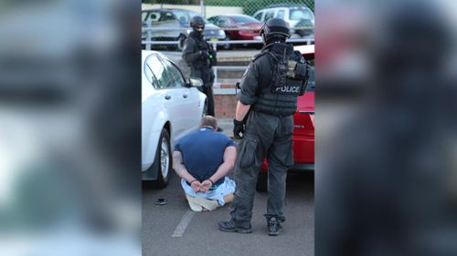 Ten arrested as bikie raids across Sydney net haul of drugs and ‘military style’ weapons