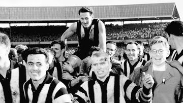 VFL Grand Final, 1958. Melbourne v Collingwood, MCG, 20-09-1958: Collingwood defeated Melbourne 12.10 to 9.10. Collingwood players carry active captain Murray Weideman off the field