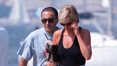 Diana, Princess of Wales, and her companion Dodi Fayed, walk on a pontoon in the French Riviera resort of St Tropez on August 22, 1997. (AAP)