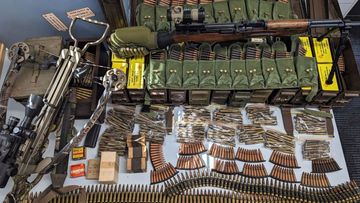 Rifle, crossbow, and inert bomb seized at SA property