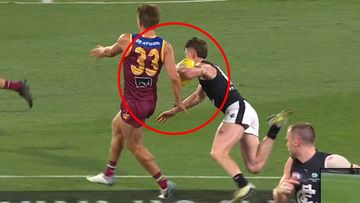 Sam Walsh tripping over Zac Bailey.