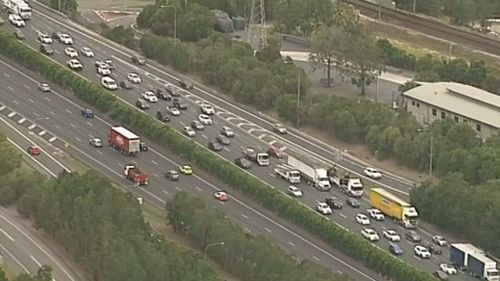 Truck rollover causes lengthy delays for commuters south of Brisbane