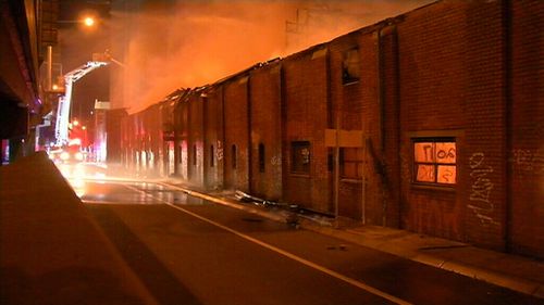 The fire is near the iconic Nylex neon sign. (9NEWS)