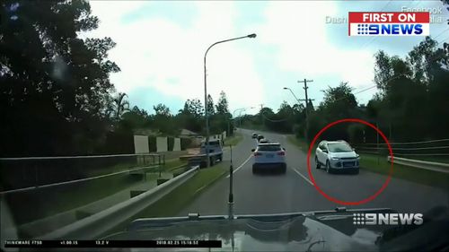 Dash-cam spotted the white Mercedes driving down the highway. (9NEWS)