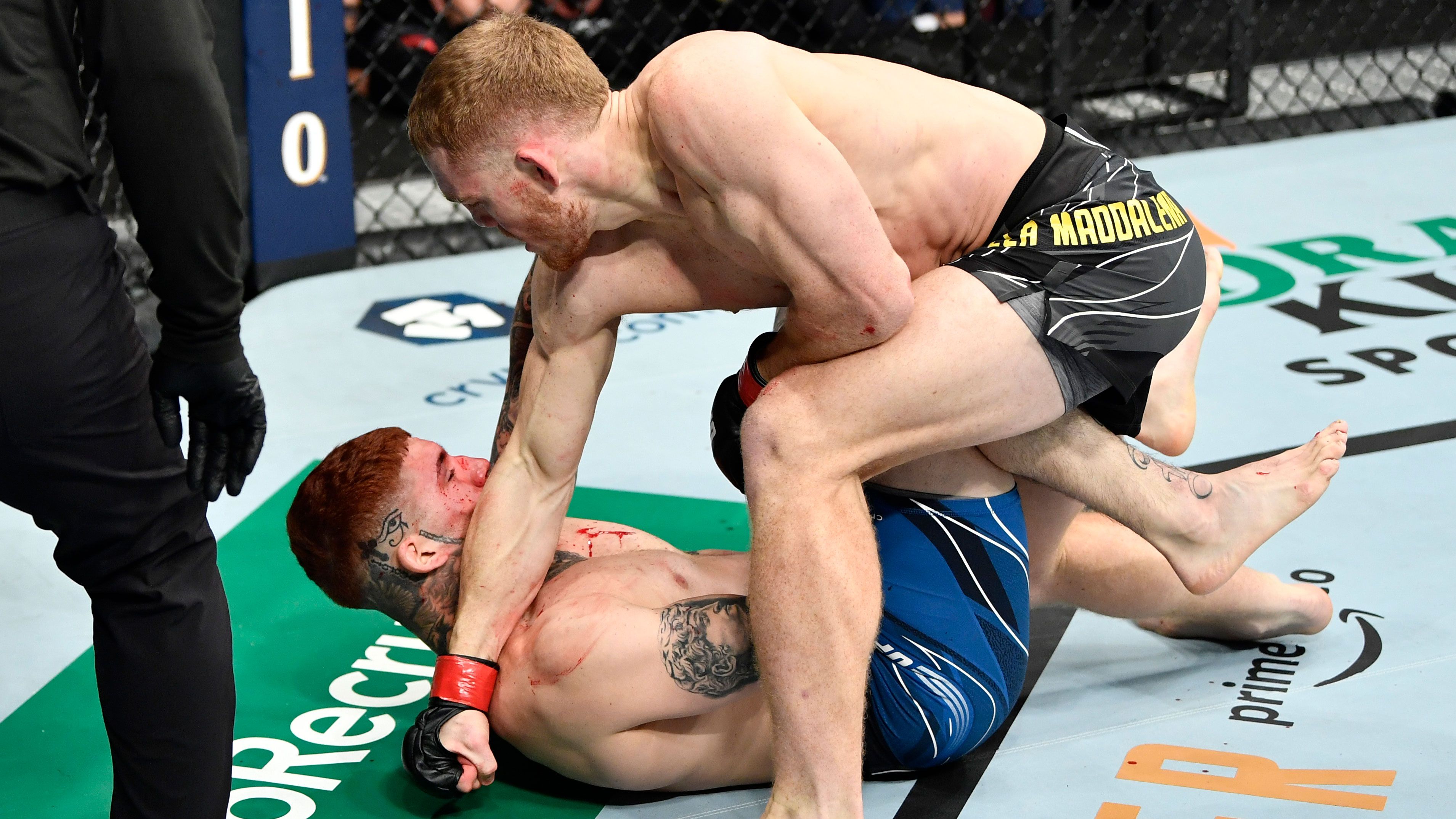 Jack Della Maddalena goes in for the kill against Pete Rodriguez in their welterweight bout during UFC 270 at the Honda Center.