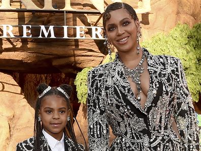 Beyonce, right, and her daughter Blue Ivy Carter arrive at the world premiere of "The Lion King" in Los Angeles on July 9, 2019. 