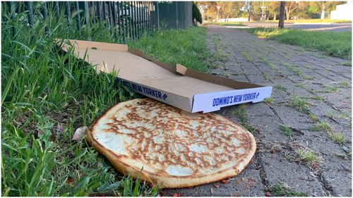 A man has been charged after allegedly using his own phone to call a pizza delivery man and rob him in Adselaide's north.