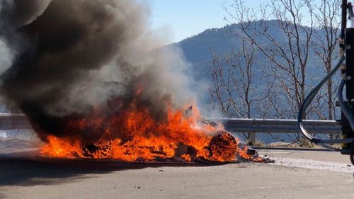 They stopped the car immediately and the presenters made it out safely. (AAP)