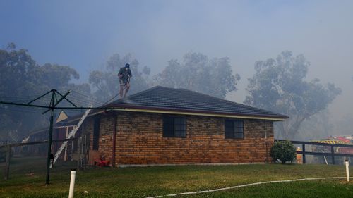 The Campvale bushfire burning north of Newcastle, NSW has been downgraded to an 'Advice' level.