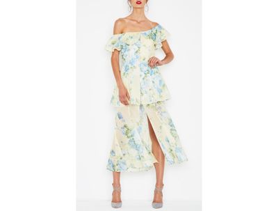 A breezy Melbourne Cup finish. Florals tick the box on the big day and the long skirt balances out the bare shoulders. Add a wide brim hat and you're in the starting gates.