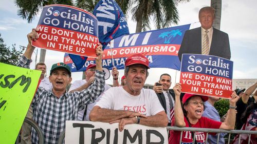 Trump supporters protest the debate.