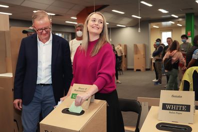 Australian Labor Leader Anthony Albanese looks on as partner Jodie Haydon votes at Marrickville Library in the electorate of Grayndler on May 21, 2022 in Sydney, Australia. 