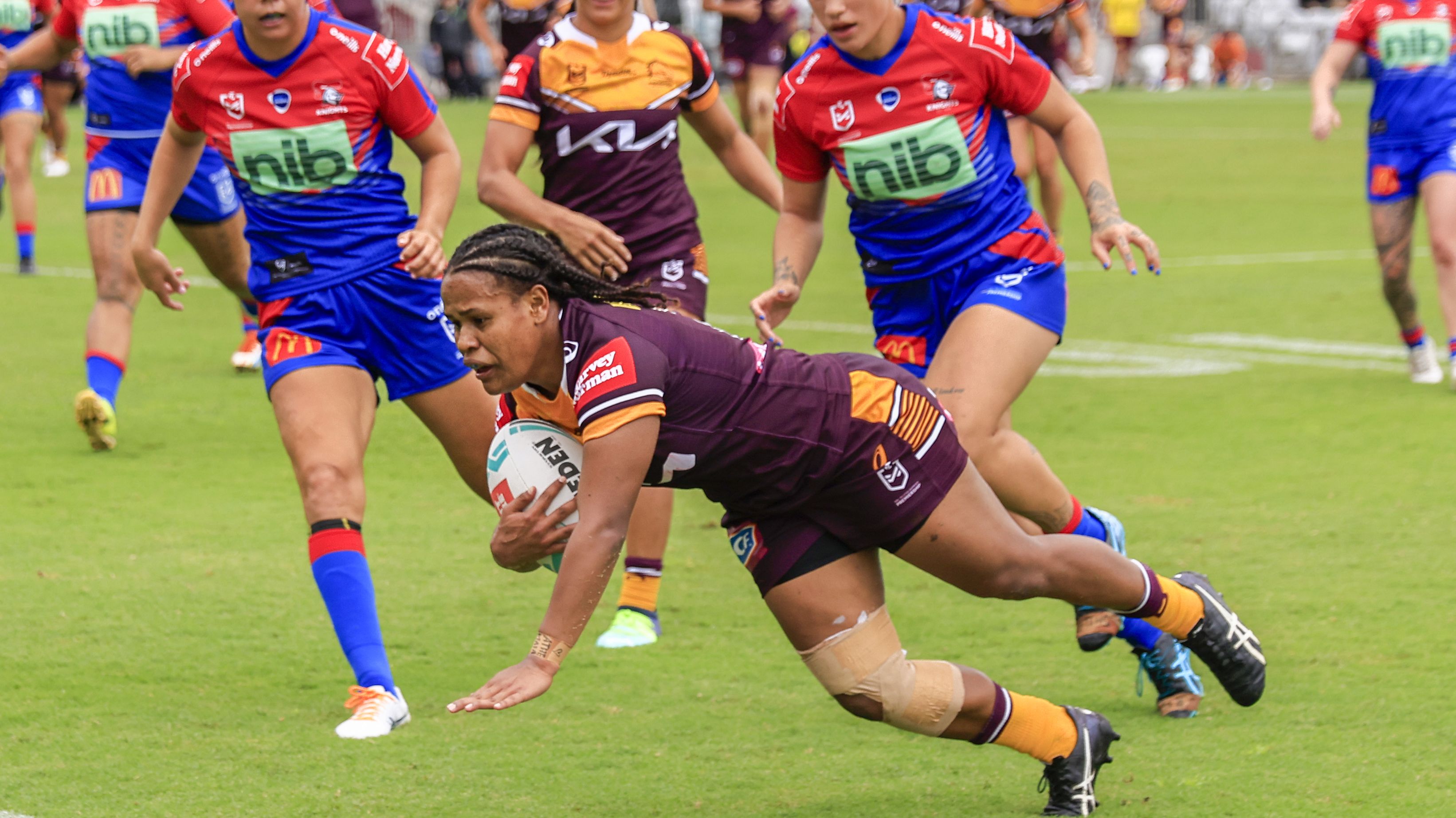 Hagiga Mosby of the Broncos scores a try during the round two NRLW match between the Newcastle Knights and the Brisbane Broncos at WIN Stadium.