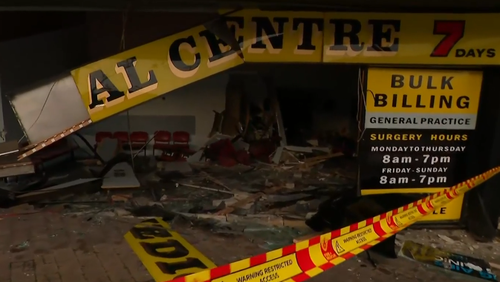 Aï»¿ teenage boy is under police guard in hospital after an alleged stolen BMW sped through traffic before crashing into a medical centre in Sydney's west. The 16-year-old allegedly drove the stolen BMW through the front of a medical centre in St Mary's at Midnightï»¿ following a police pursuit. 