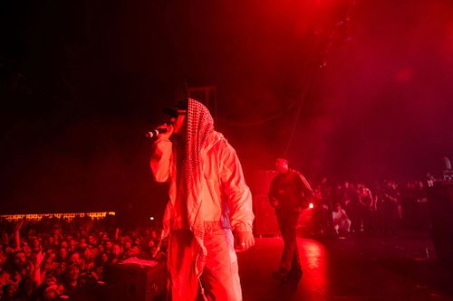 INDIO, CALIFORNIA - APRIL 18: (FOR EDITORIAL USE ONLY) Members of the band Kneecap including Mo Chara and Moglai Bap perform onstage during Day 1 of Coachella Valley Music and Arts Festival on April 18, 2025 in Indio, California. (Photo by Scott Dudelson/Getty Images for Coachella)