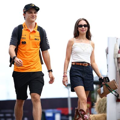 AUSTIN, TEXAS - OCTOBER 18: Oscar Piastri of Australia and McLaren and Lily Zneimer arrive in the Paddock prior to the Sprint ahead of the F1 Grand Prix of United States at Circuit of The Americas on October 18, 2025 in Austin, Texas. (Photo by Jared C. Tilton/Getty Images)