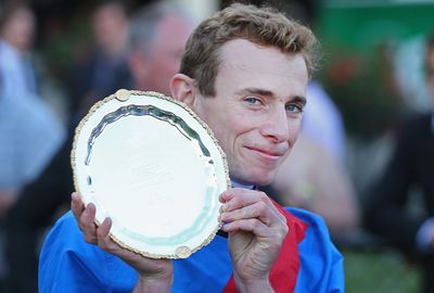 Ryan Moore poses with the Cox Plate. (Getty)