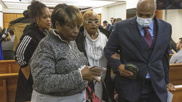 Manny Ellis&#x27; mother Marcia Carter-Patterson escorted out by her attorney and other family.