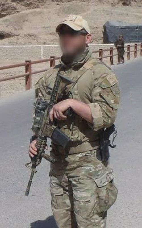Former Australian soldier Shane Healey pictured on patrol in 2012, in southern Afghanistan - a part of the country he claims will welcome the rise of the Taliban.