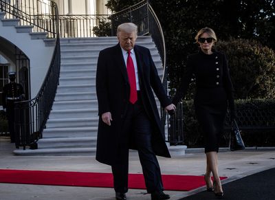 Donald and Melania Trump stoic as they leave the White House following election loss