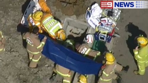 A man is trapped in a pit in Whittlesea. (9NEWS)