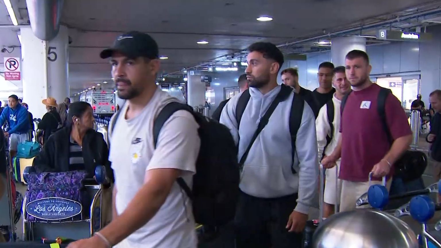 Rabbitohs touch down in Los Angeles to heartfelt welcome from club fan battling cancer 