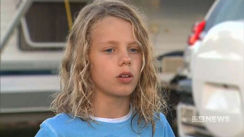 Jordan Spraggs, 11, is lucky to be alive after a deep hole he was digging in sand on a beach south of Adelaide collapsed on him. Picture: 9NEWS.