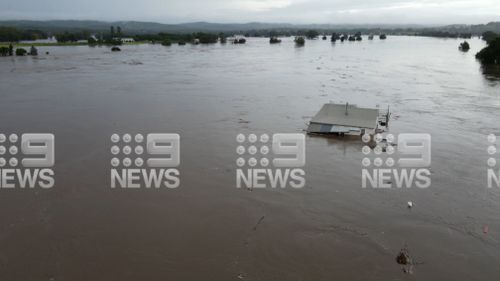 House floats off in Taree, NSW flood.