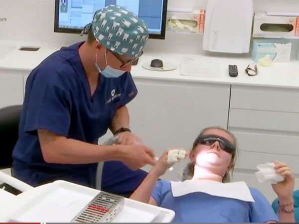 Clarke goes undercover as dentist