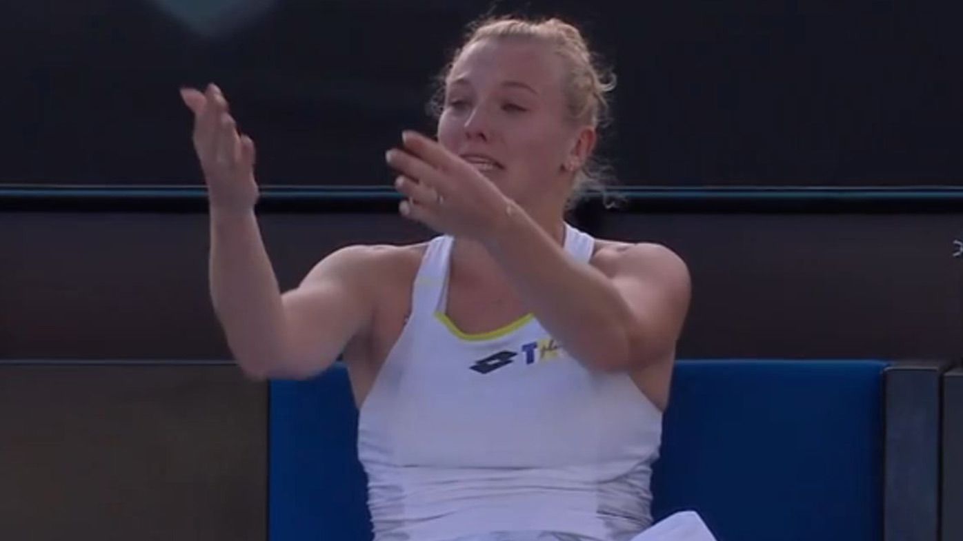 Kateřina Siniaková gestures to her box after an emotional reaction. 