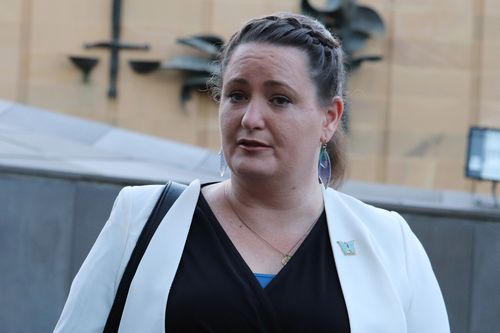 Child sexual abuse survivor Katrina Munting outside the Supreme Court of Tasmania.
