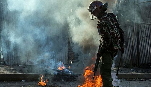 Police on patrol during a protest in Mathare slum, one of the opposition strongholds in Nairobi. (Photo: AP).