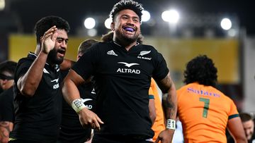 Ardie Savea of the All Blacks celebrates the try scored by Codie Taylor.