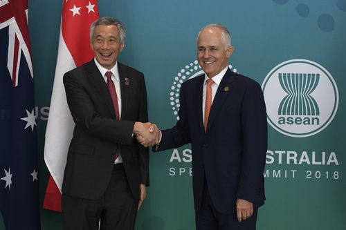 Singapore Prime Minister Lee Hsien Loong and Australian Prime Minister Malcolm Turnbull pose for a photograph following the Singapore-Australia Annual Leaders' Dialogue. Picture: AAP